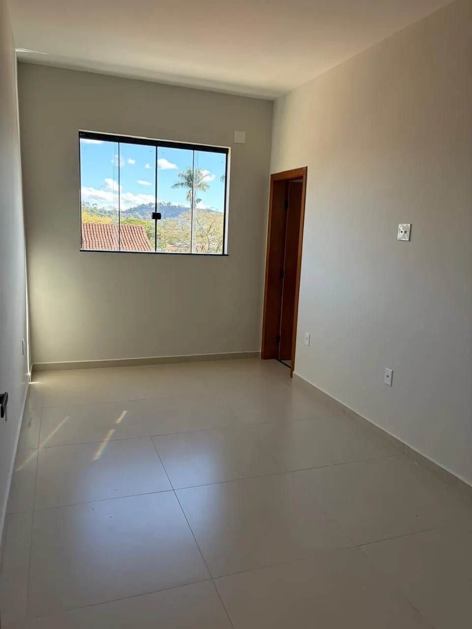 Quarto com vista para as colinas